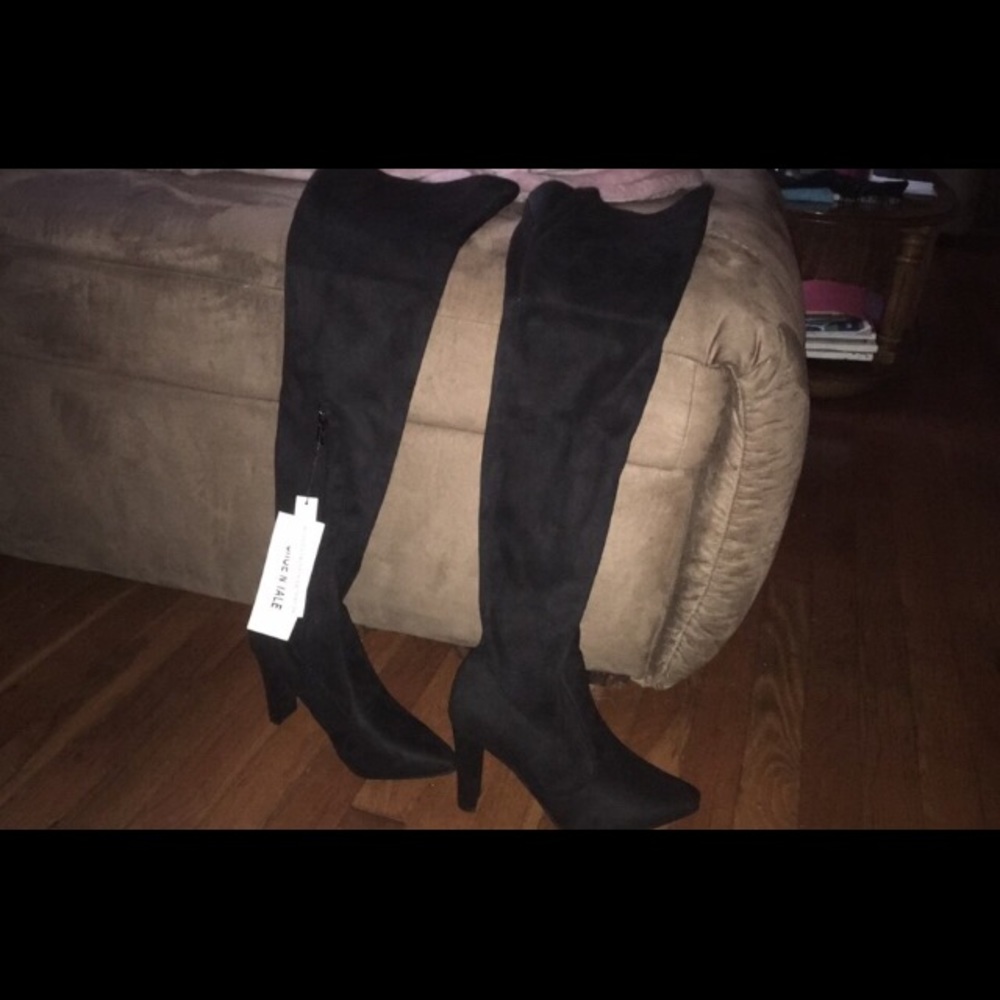Black thigh high boots